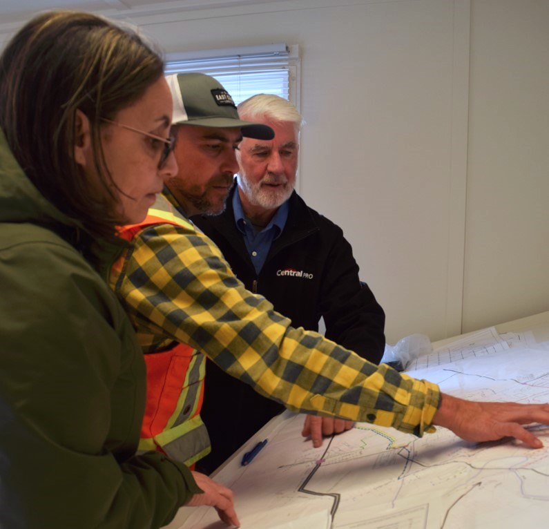 Councillors Jack Sullivan and Juanita Pelly review the Antigonish Electric Utility distribution map with Engineer Ray Sampson