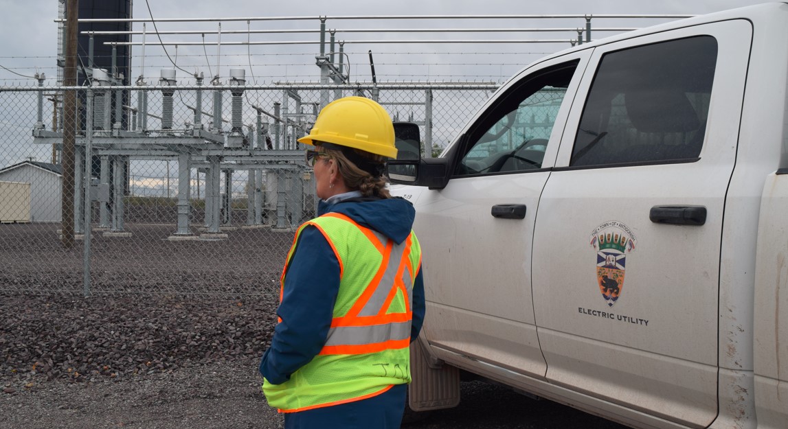 Strategic Initiatives Coordinator Lise Roy looking at the new AEU Substation