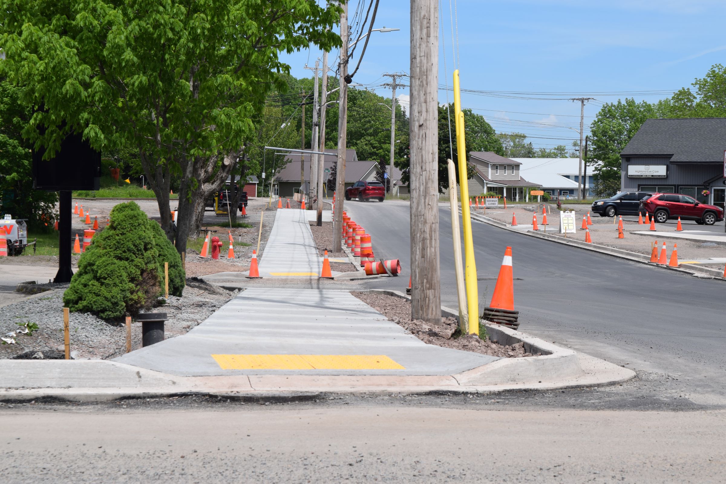 Image showing landscape view of Bay Street in the Town of Antigonish. Road work infrastructure is in place. New concrete has been poured to create new sidewalks.